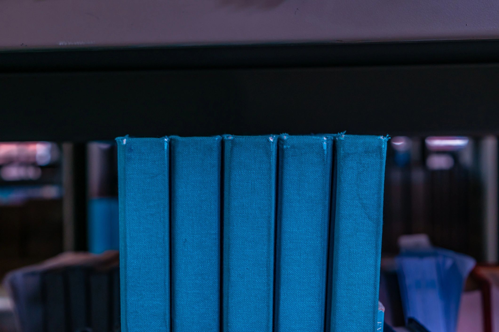 Stacked books symbolizing faith resources and study