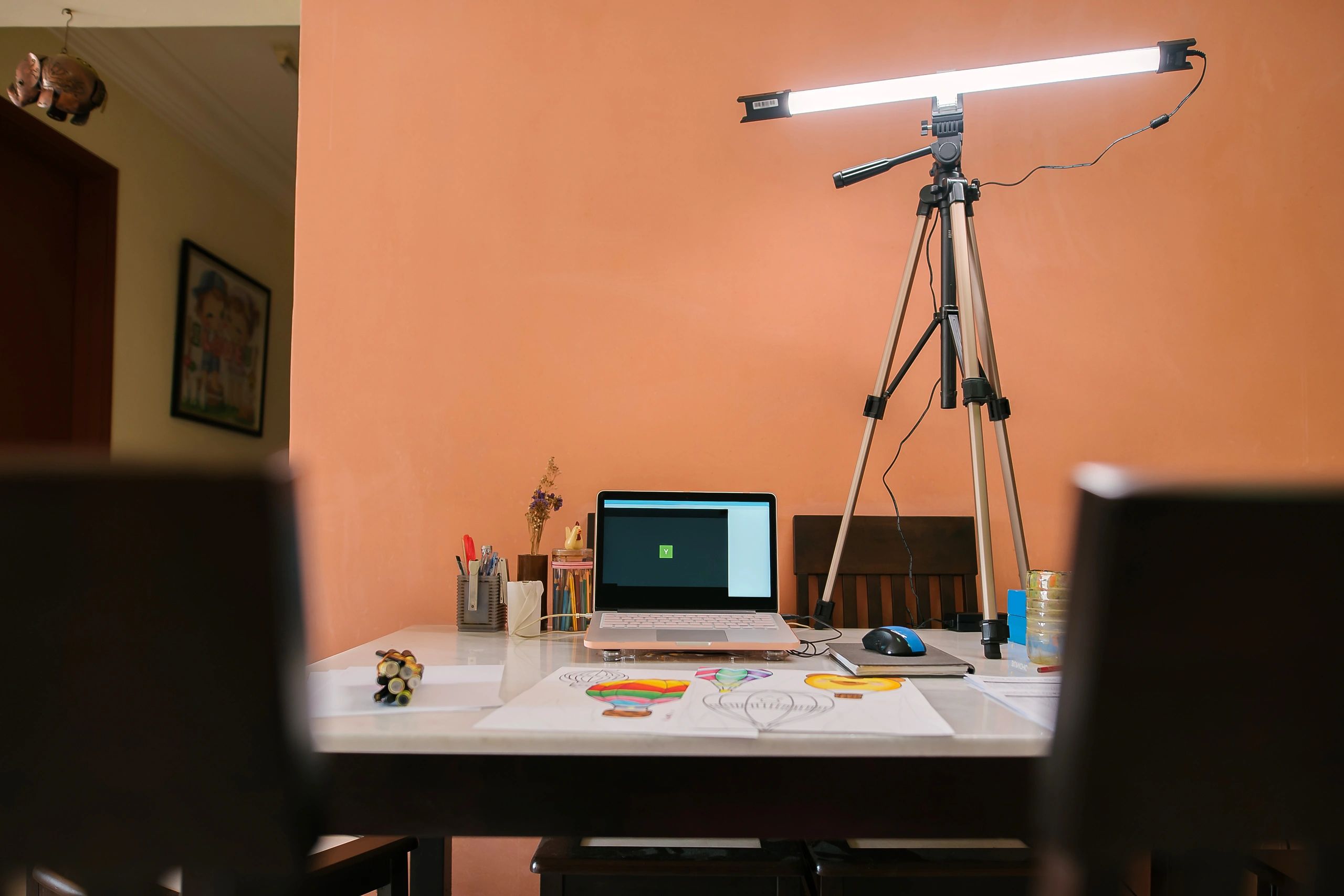Laptop and media setup representing digital Christian teaching