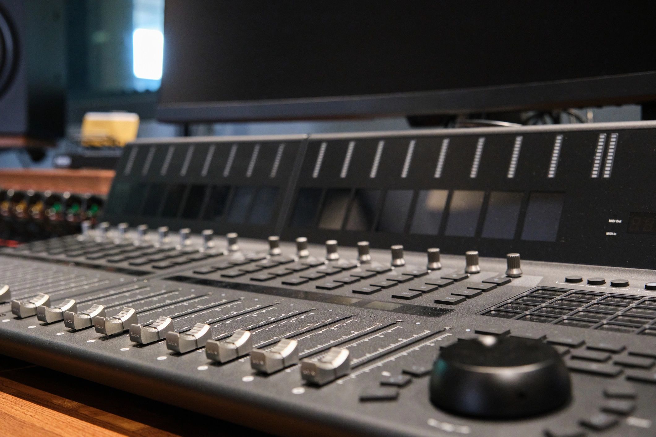 Professional audio mixer representing podcast production
