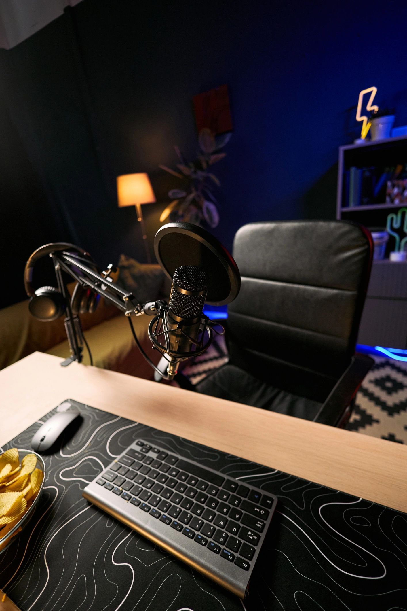 Podcast studio setup with microphone and headphones
